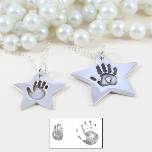 Silver star hand print necklace