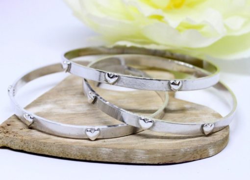 personalised silver bangle with milestone hearts