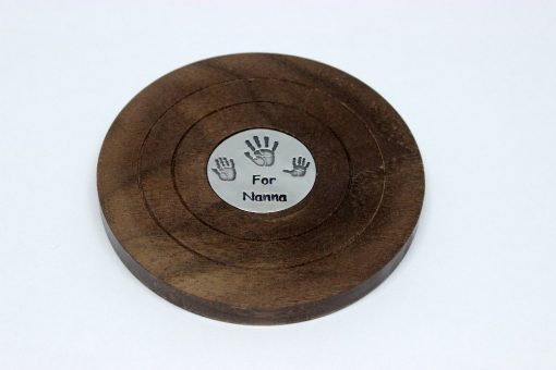 personalised wooden coaster with silver handprints